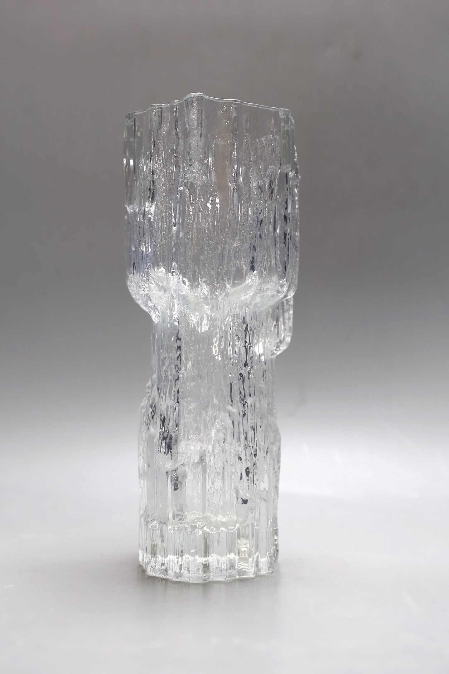 A Tapio Wirkkala clear glass art vase by Iittala Glass, Finland, etched signature marks to base. 24cm tall